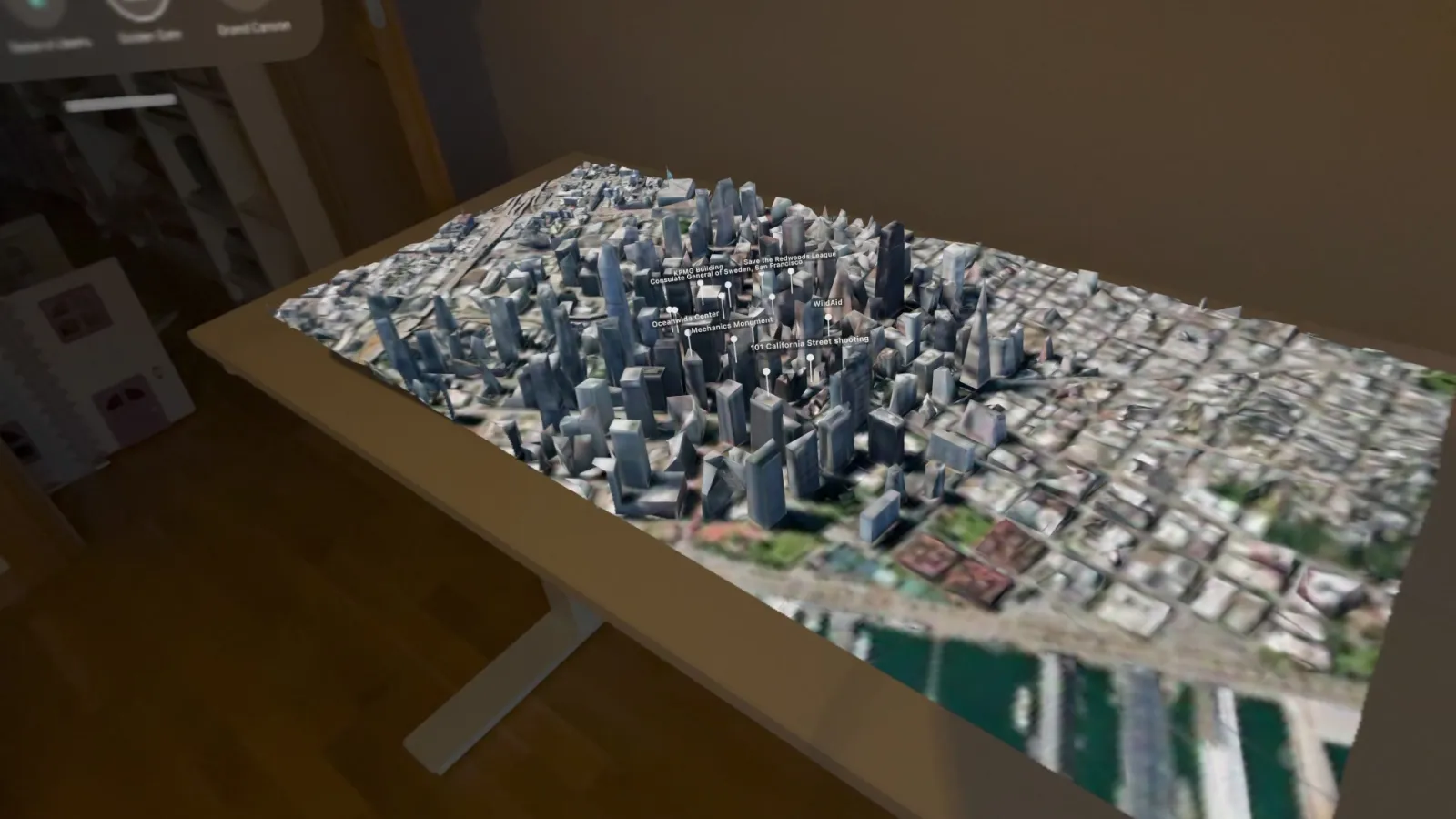 San Francisco's downtown in 3D, laid over a real desk